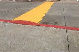 Yellow speed bump in Donelson, TN parking lot